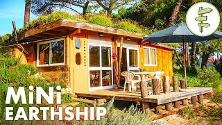 Tiny Earthship Style Cabin Built with Recycled Tires amp Green Roof [upl. by Retnyw]