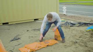 How to fill sandbags for flooding [upl. by Ettezzil71]