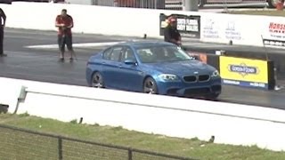 2013 BMW M5 F10 Drag Racing 14 Mile Launch Control runs 119  118 MPH All Stock [upl. by Xirtaeb]