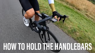 How to hold the road bike handlebars for power and stability [upl. by Novert1]