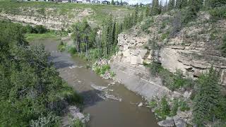 Cinematic drone flight at Jumping Pound Creek [upl. by Ahsircal276]