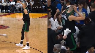 Kristaps Porzingis puts jersey over his head after scary non contact leg injury vs Heat 😬 [upl. by Anali]