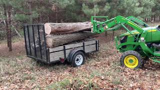 John Deere 3025D Loading bigger logs [upl. by Rie506]