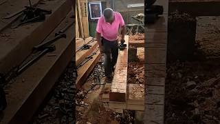 Veteran carpenter treats solid wood beams with handheld planer workwoodworking shorts [upl. by Dolley]