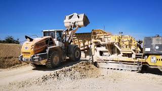 Liebherr L550 loader feeds a Hartl mobile crusher [upl. by Flavius577]