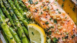 Baked Salmon and Asparagus in Foil  Healthy and tasty baked salmon with lemon butter amp asparagus [upl. by Berget557]