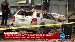 2 people sent to hospital after car crashes into Boost Mobile store in Portland [upl. by Arras]