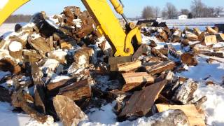 Splitting firewood made easy with Custom Backhoe Splitter [upl. by Hcurob]