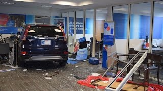 BMO Harris Bank branch damage after an SUV drove through the front door [upl. by Eanahc]