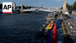 Paris 2024 director maintains confidence over Olympic triathlon swim on Seine River [upl. by Eberhart]