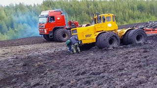 Heavy tractor got stuck in mud Powerful tractors work in extreme off road conditions [upl. by Efar350]