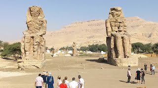 Egypts Huge Colossi of Memnon Statues [upl. by Lladnor819]