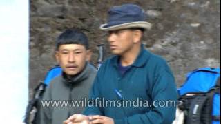 Mountaineers rest and drinks tea at a stall  Everest expedition [upl. by Eniksre]