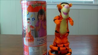 DISNEYS TURBO TAIL TIGGER ELECTRONIC SINGING BOUNCING PLUSH TOY VIDEO REVIEW [upl. by Aneeuq6]