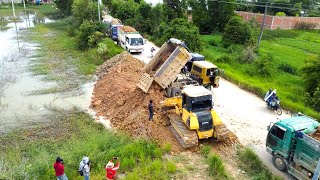 Perfect Strong Bulldozer KOMATSU DX51P Working push soil filling up with Many Dump trucks dumping [upl. by Pennie]