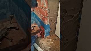 The process of installing ceramic tiles on a corner using a cord level [upl. by Urion]