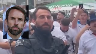 England fans sing to Gareth Southgate lookalike German policeman Southgate You’re The One [upl. by Marya]