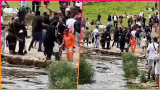 Moment a huge fight breaks out at the beauty spot of Dovedale Stepping Stones as people throw large [upl. by Scevo]