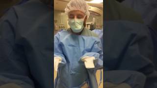 Gowning and Gloving self and surgeon video with comentrary Source [upl. by Burman]