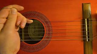 Restringing a Classical Nylon String Guitar with string break [upl. by Enahsal254]