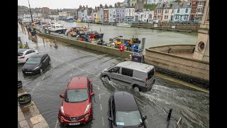 Flooding beneath the town bridge at Weymouth Harbour [upl. by Ahsaercal]