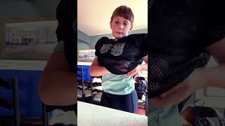 How to put shoulder pads on football [upl. by Wardieu]