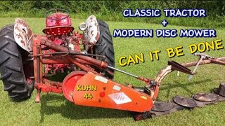 Classic tractor hooked to a modern disc mower Ive never seen this before [upl. by Alded]