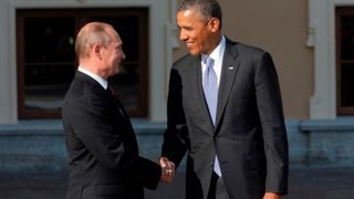 Obama and Putin greet with long handshake [upl. by Asnerek]