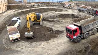 Komatsu PC 450LC and lots of trucks [upl. by Repsac]