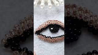 How to make evil eye beaded earrings with tassels shorts [upl. by Sucirdor132]