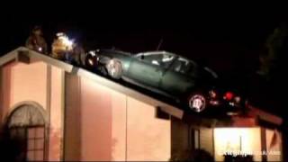 Car drives onto roof by mistake in California [upl. by Iveel535]