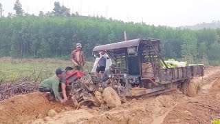 Vehicle carrying tree seedlings over muddy road [upl. by Nnagrom]