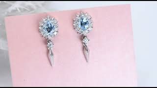 Sky Blue Topaz amp White Zircon Dangle Earrings In Rhodium over Sterling Silver 175ctw [upl. by Bowman]