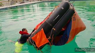 Basic Training  How to Upright an Inverted Liferaft [upl. by Enamrahs]