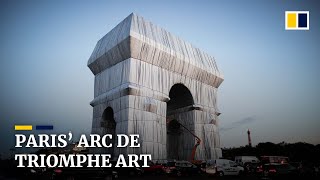 ‘L’Arc de Triomphe Wrapped’ Paris monument enveloped in fabric for art installation [upl. by Gelhar]