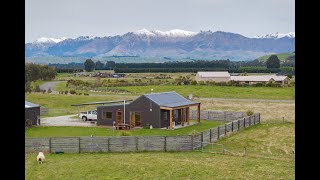 88 Holmwood Road Manapouri Southland TAN40386 [upl. by Ahsatsana]