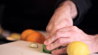 Cutting Lemons and Limes for the Bar  DrinkSkool Bar Techniques [upl. by Linder]