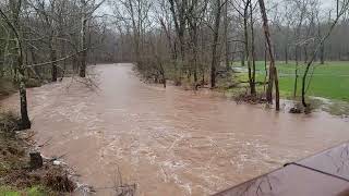 Crazy flooding of the creek through Fischers Park in Harleysville PA on 32324 [upl. by Nalod]