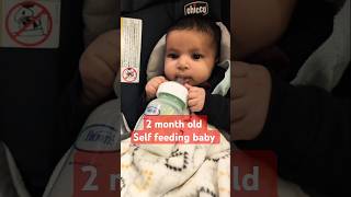 Baby Self feeding  2 month old self feeding baby bottle babys early feeding milestone [upl. by Balfour494]