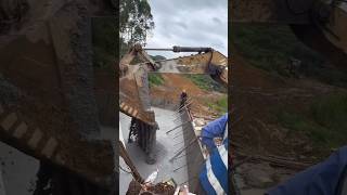 The process of pouring concrete for rough stone retaining wall [upl. by Bixler425]