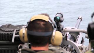 Deck Gun Fired At Sea By Sailors Aboard USS Kearsarge  25mm Mk38 Gun Fired At Moving Target [upl. by Ainerbas483]