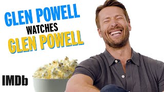 GLEN POWELL watches Glen Powell  Hit Man Interview  IMDb [upl. by Betteann]