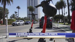 3wheeled scooters hitting streets [upl. by Evatsug]