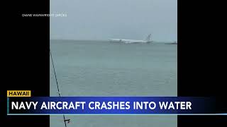 Navy plane ends up in ocean after overshooting runway in Hawaii all 9 aboard escape unharmed [upl. by Atteuqnas442]