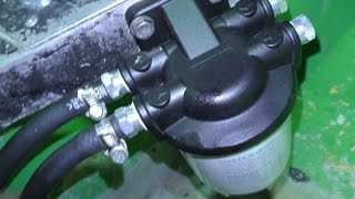 Installing a water separating fuel filter in a boat [upl. by Inaliak]