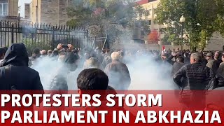 Protesters Storm Parliament In Abkhazia Amid Dispute Over Russian Investment Treaty  N18G [upl. by Sirred397]