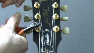 How to re string a guitar [upl. by Coray]