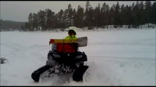 Suzuki King quad 750 4x4 ATV with Camoplast tatou 4s snow tracks kit belter 4 four wheeler [upl. by Ryley645]