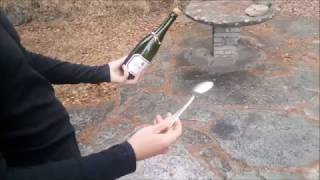 How to saber a Champagne bottle with a spoon [upl. by Calvert]