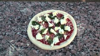 How to Open and Stretch Your Pizza Dough Ball and the Transfer [upl. by Enymsaj]